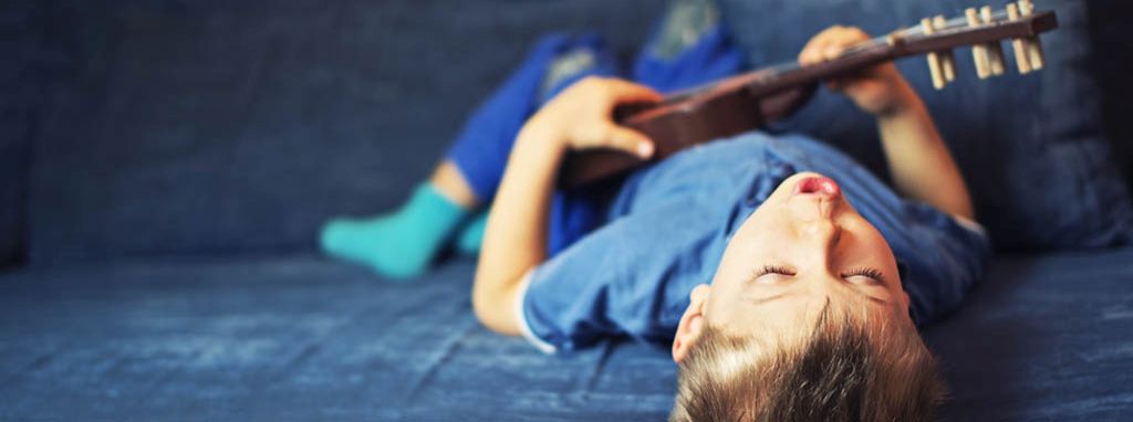 child with guitar