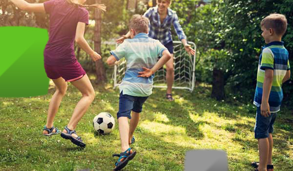 Family playing football