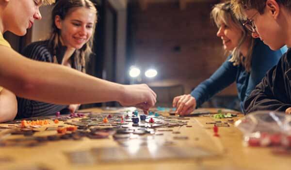 People playing board game