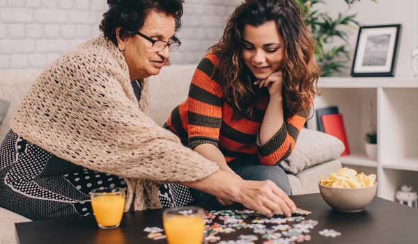 People doing puzzle