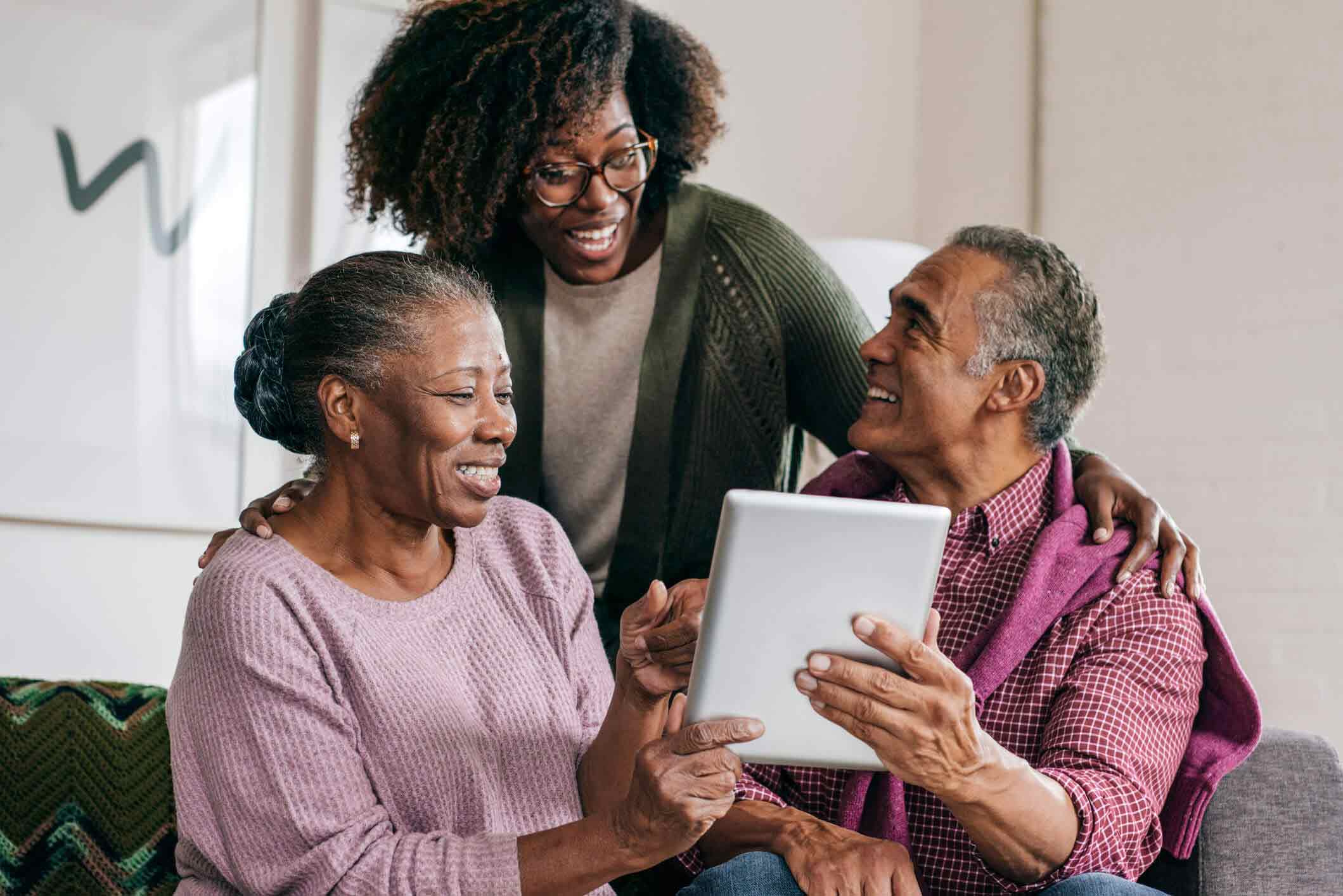 family looking at tablet