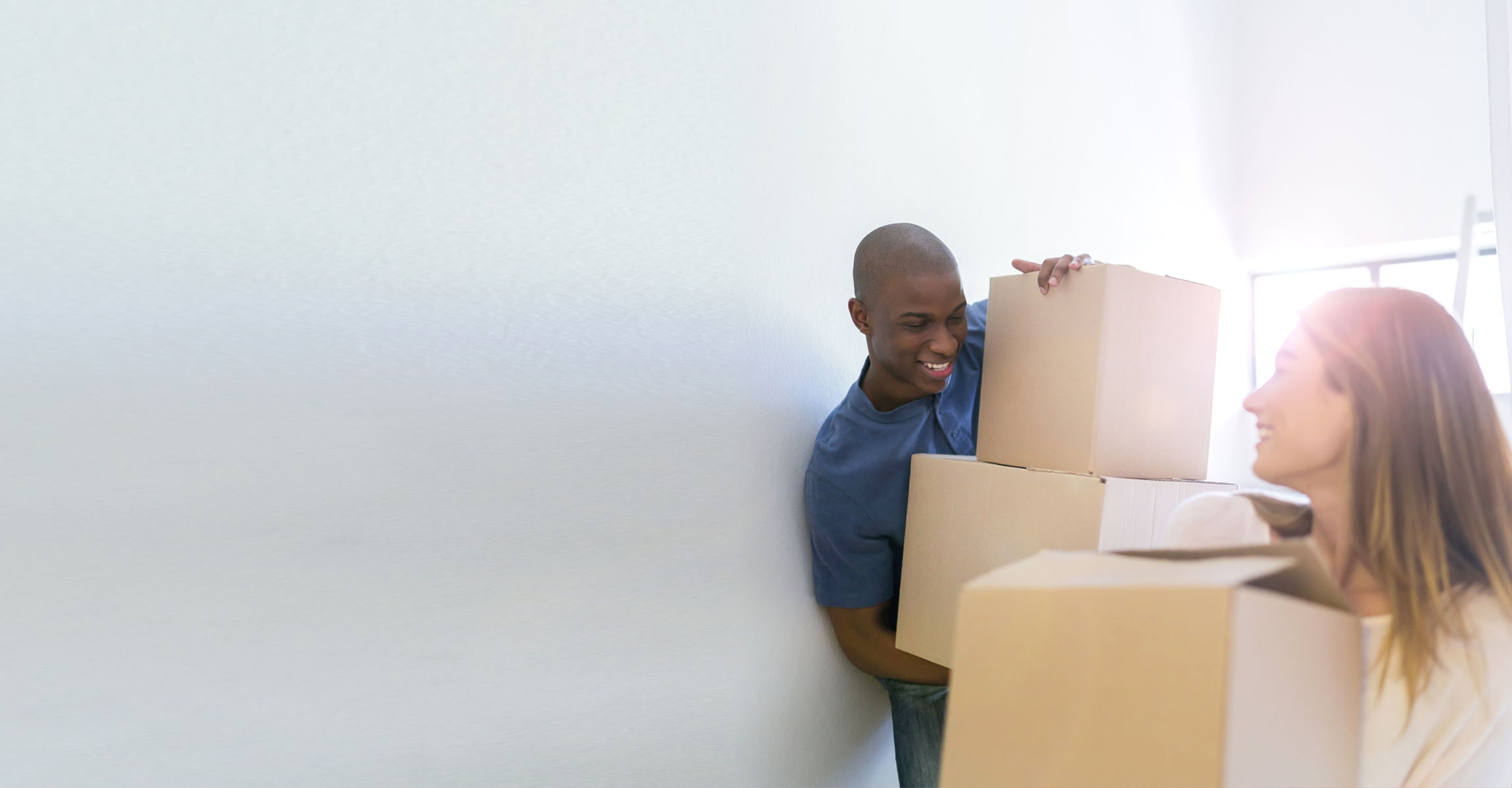 Man and woman with boxes