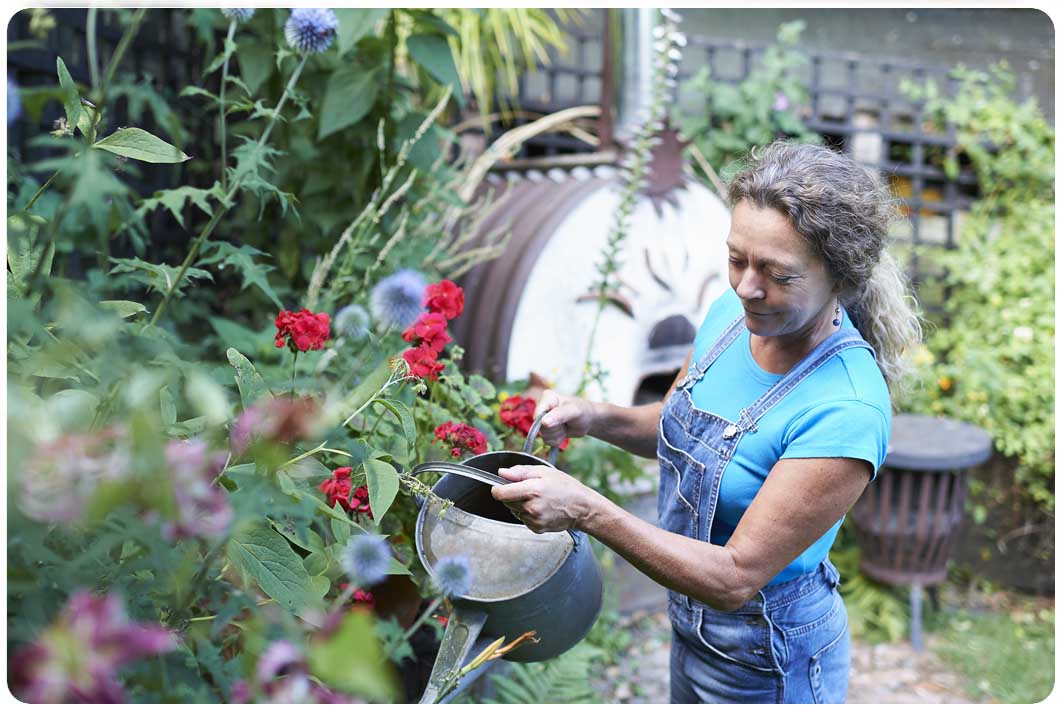 woman watering garden