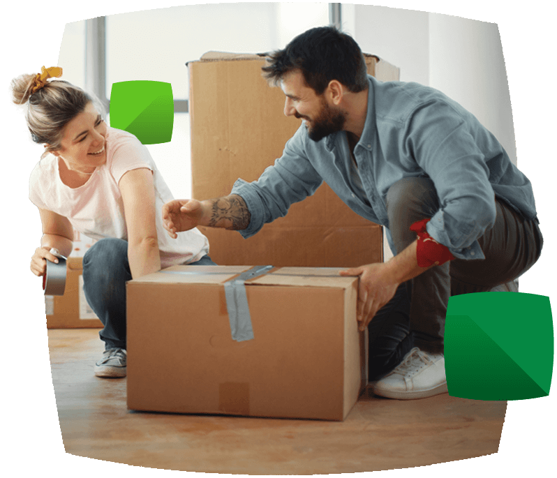 Couple sealing boxes with packing tape